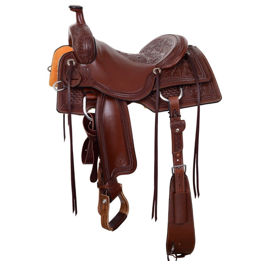 cutting saddle, medium brown with tooling on the seat and 6 sets of tie strings. 
